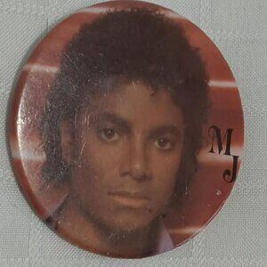 Strange & unusual vintage button pin featuring Michael Jackson